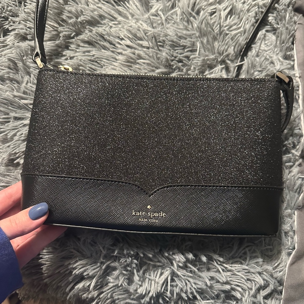 Kate Spade cross body black glitter purse.